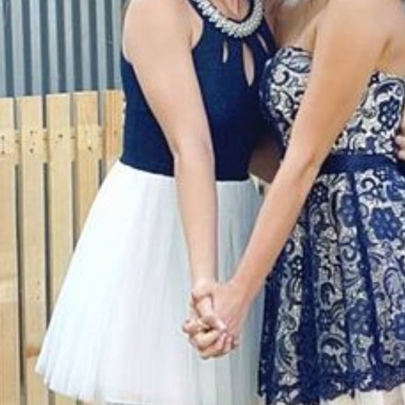 Dress on the left with blue bodes and white skirt with pearl neckline - Picture 2 of 2